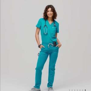 Figs limited edition Teal Yola scrub pants .